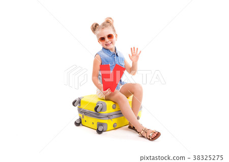 Attractive little girl in blue shirt, white shorts Attractive little girl in blue shirt, white shorts 38325275