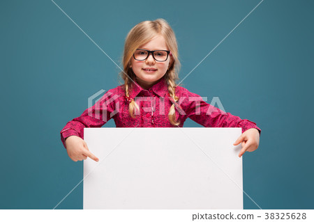 Adorable little girl in pink shirt, black trousers Adorable little girl in pink shirt, black trousers 38325628