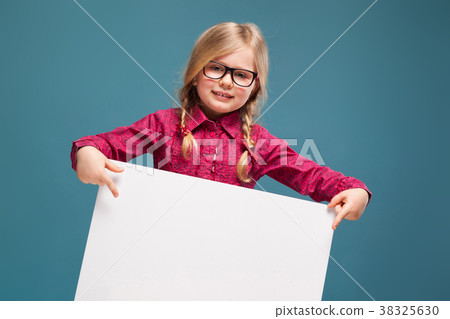 Adorable little girl in pink shirt, black trousers Adorable little girl in pink shirt, black trousers 38325630