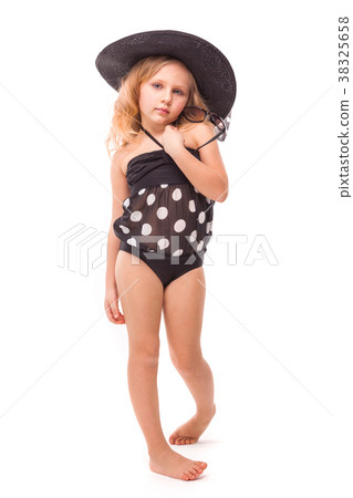 Attractive cute little girl in in black swimwear Attractive cute little girl in in black swimwear 38325658
