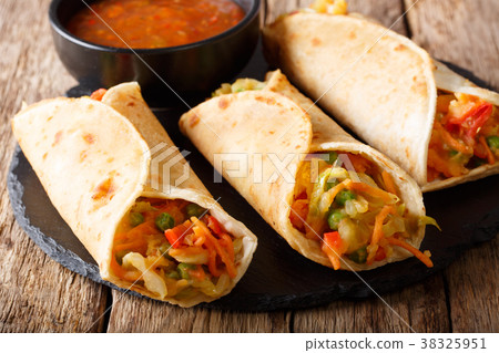 Indian street Veg roll Frankie stuffed Indian street Veg roll Frankie stuffed 38325951