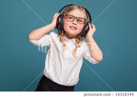 Pretty, cute little girl in white shirt, glasses 38326349
