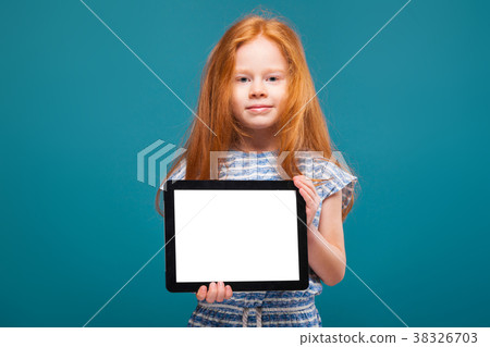 Beauty little girl in tee shirt with long hair 38326703