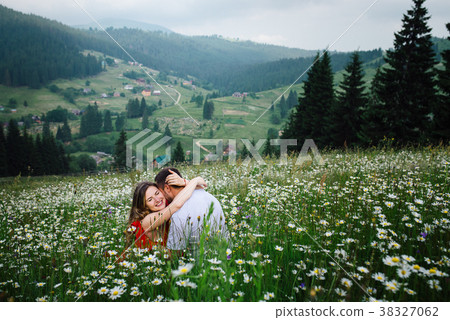 Romantic outdoor portrait. Gorgeous blonde smiling 38327062