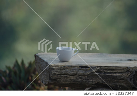 hot coffee on the old log 38327347