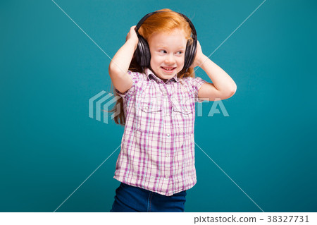 Beautiful, cute little girl in checkered shirt and 38327731