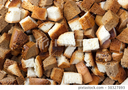 Background from many small rusks on table Background from many small rusks on table 38327893