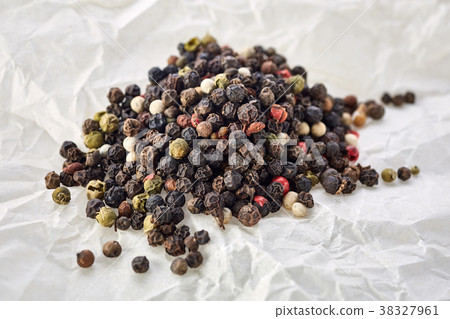 Top view on black, red and white peppercorns Top view on black, red and white peppercorns 38327961