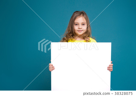 Pretty, little girl in tee shirt with brown hair Pretty, little girl in tee shirt with brown hair 38328075