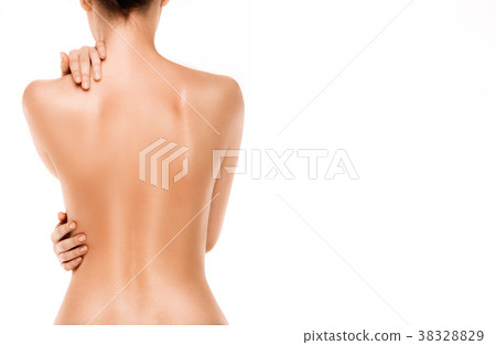 Naked back of a woman, isolated on white Naked back of a woman, isolated on white 38328829