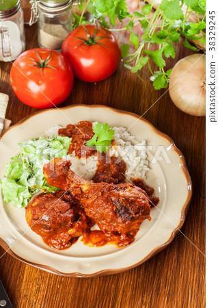 Chicken drumstick curry with rice Chicken drumstick curry with rice 38329245