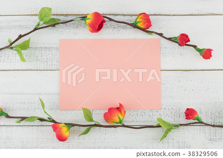 Blank pink cards decorated with fake red flower Blank pink cards decorated with fake red flower 38329506