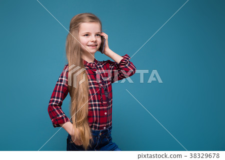 Pretty girl in shirt with long hair hold the phone Pretty girl in shirt with long hair hold the phone 38329678