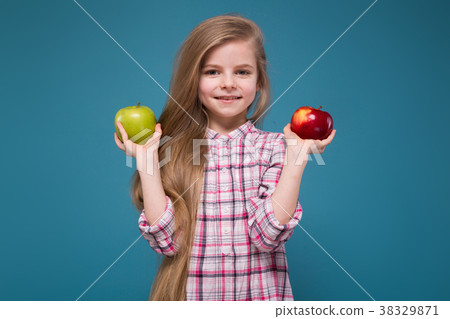 Little beauty girl in shirt with long brown hair Little beauty girl in shirt with long brown hair 38329871