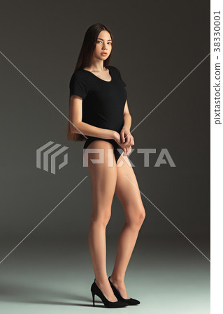 Fashion woman portrait. Beautiful teen model in a Fashion woman portrait. Beautiful teen model in a 38330001