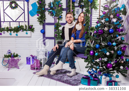 couple in love on a white terrace sits on the couple in love on a white terrace sits on the 38331108
