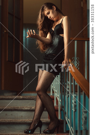 The woman in the doorway was a drug addict. The woman in the doorway was a drug addict. 38331158
