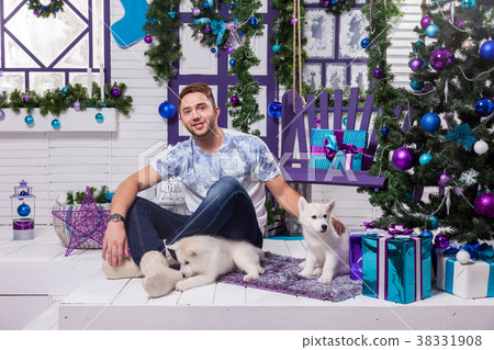 beautiful man sitting on a terrace next to a beautiful man sitting on a terrace next to a 38331908