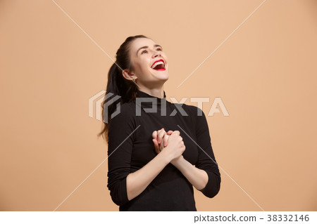 Winning success woman happy ecstatic celebrating Winning success woman happy ecstatic celebrating 38332146