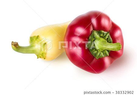 Two raw pepper with green tails, cut out with the 38332902