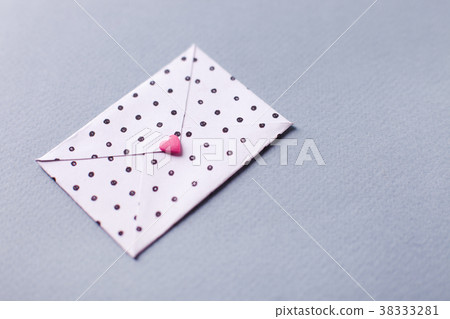 White dotted envelope with pink heart shaped figur White dotted envelope with pink heart shaped figur 38333281