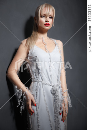 Beautiful girl in designer fashionable transparent 38333521