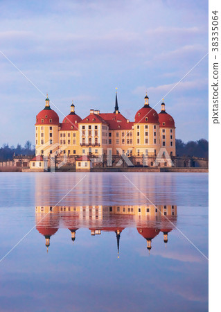 Moritzburg castle after sunrise at winter time 38335064