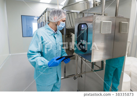medical worker is checking the readings medical worker is checking the readings 38335873