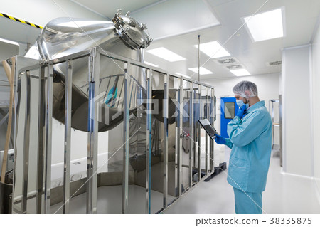 medical worker is checking the readings medical worker is checking the readings 38335875