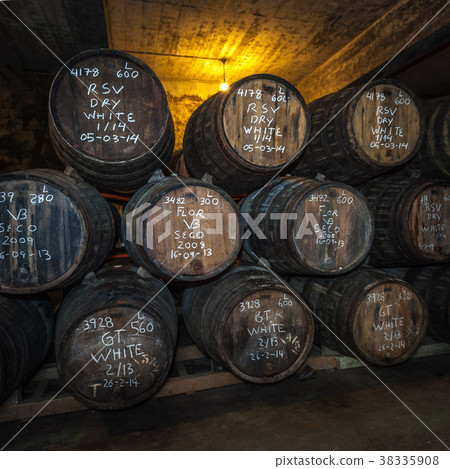 Port wine barrels in cellar, Porto, Portugal Port wine barrels in cellar, Porto, Portugal 38335908
