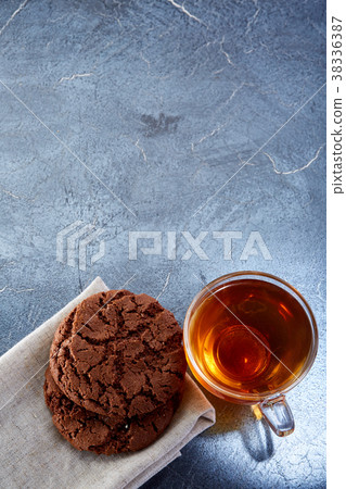 Vertical picture of a glass cup of black tea with Vertical picture of a glass cup of black tea with 38336387