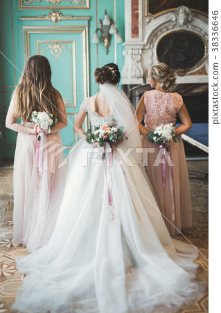 Bride holding big and beautiful wedding bouquet Bride holding big and beautiful wedding bouquet 38336646