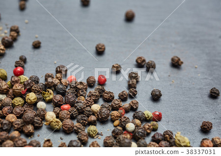 Allspice seeds isolated on dark background Allspice seeds isolated on dark background 38337031