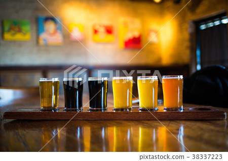 A variety set of craft beers light and dark 38337223