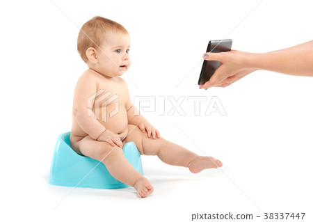 baby looks at a tablet baby looks at a tablet 38337447