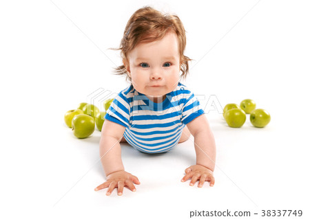 child in striped vest on the floor child in striped vest on the floor 38337749