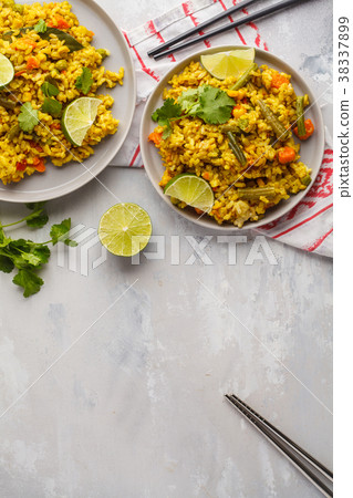 Vegetarian curry rice with vegetables  38337899