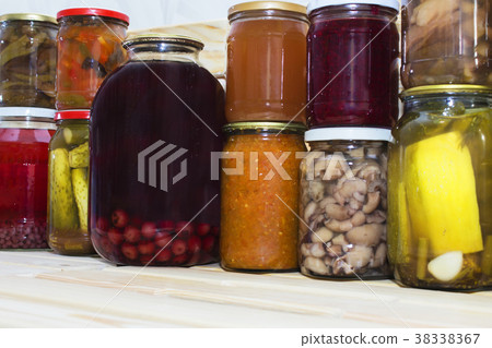 Storage shelves in pantry with homemade canned  38338367