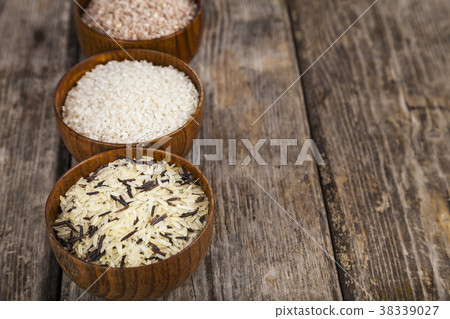 Three bowls with different varieties of rice 38339027