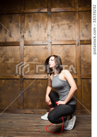 brunette girl with rope 38339292