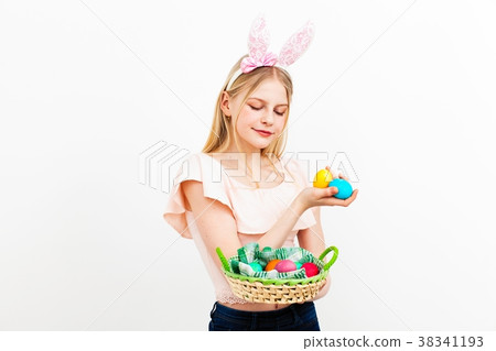 Teenage girl holding Easter eggs 38341193