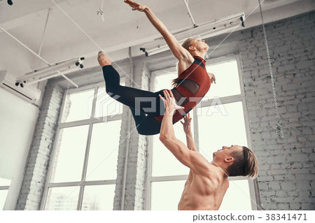 Couple of ballet dancers posing Couple of ballet dancers posing 38341471