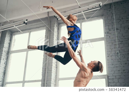 Sensual couple performing an artistic Sensual couple performing an artistic 38341472