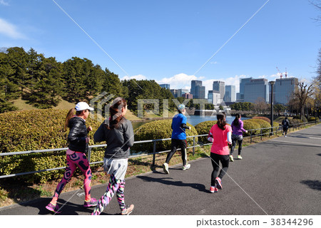 Marathon runner on imperial road 38344296