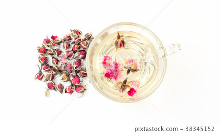 A cup of tea pink rose on a white background. A cup of tea pink rose on a white background. 38345152