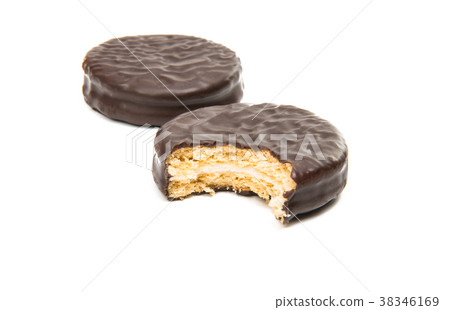 Bitten biscuit sandwich with chocolate. 38346169