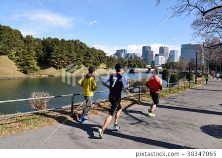 Marathon runner on imperial road 38347065