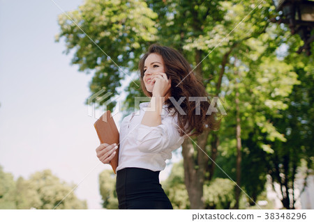 business woman enjoys gadgets business woman enjoys gadgets 38348296