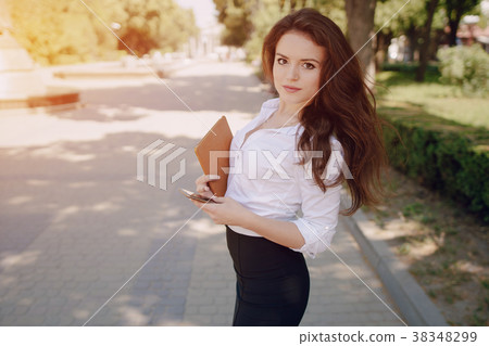 business woman enjoys gadgets business woman enjoys gadgets 38348299