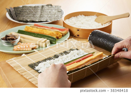 Sushi roll cooking scene 38348418